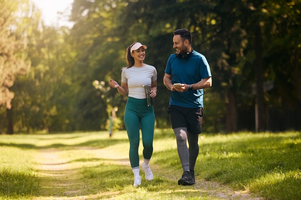 Happy,Athletic,Couple,Communicating,While,Walking,In,Nature,After,Sports Good habits to practice together